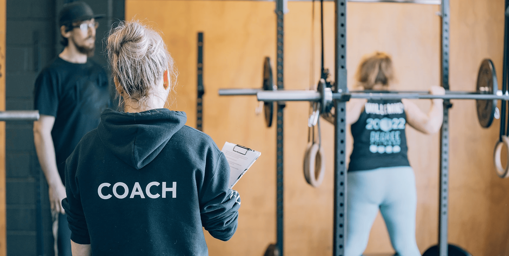 Coach leading a high-intensity session for Hyrox Training in NYC